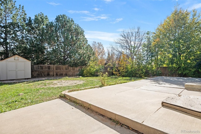 view of patio featuring a storage unit