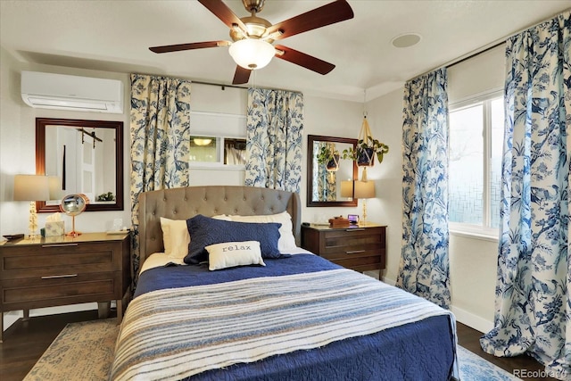 bedroom with a wall mounted air conditioner, dark hardwood / wood-style floors, and ceiling fan