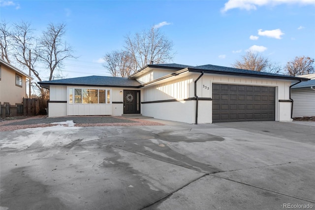 view of front of home with a garage