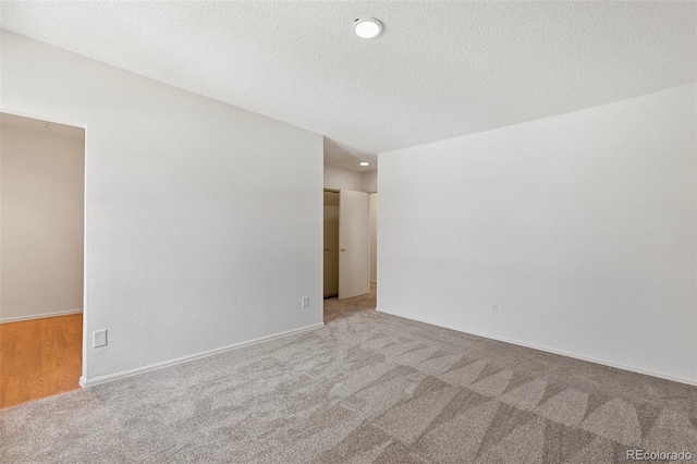 2049 Sussex Ln, Colorado Springs, CO 80909 - carpeted empty room with recessed lighting and a textured ceiling