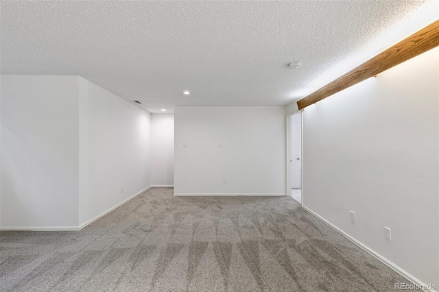 2049 Sussex Ln, Colorado Springs, CO 80909 - unfurnished room featuring carpet floors, a textured ceiling, recessed lighting, and a smoke detector