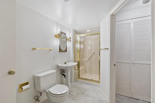 2049 Sussex Ln, Colorado Springs, CO 80909 - full bath featuring a closet, marble finish floors, and a shower stall