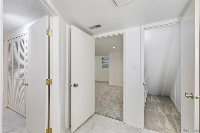 2049 Sussex Ln, Colorado Springs, CO 80909 - hallway featuring light carpet