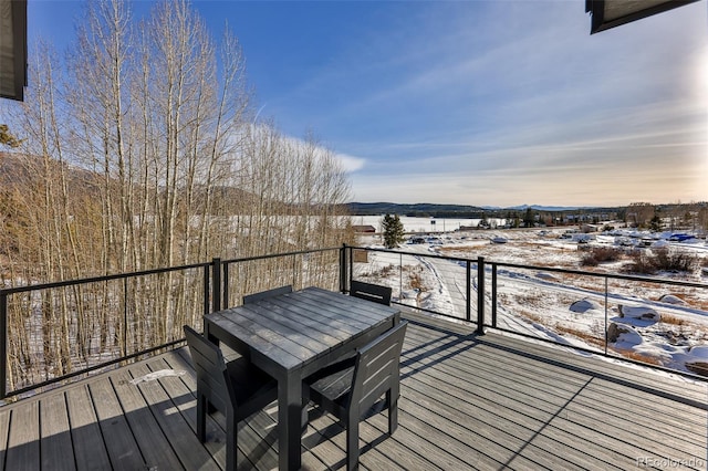 view of snow covered deck