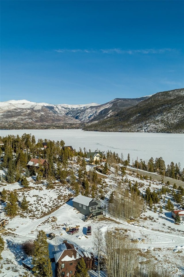 view of mountain feature with a water view