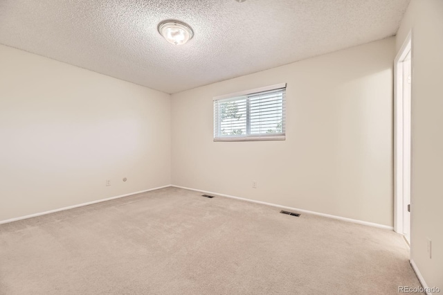 6348 S Independence St, Littleton, CO 80123 - empty room featuring carpet and a textured ceiling