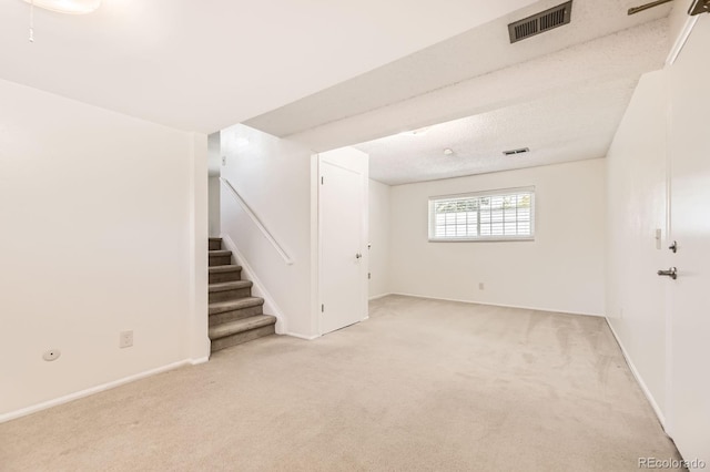 6348 S Independence St, Littleton, CO 80123 - empty room featuring light colored carpet and stairs