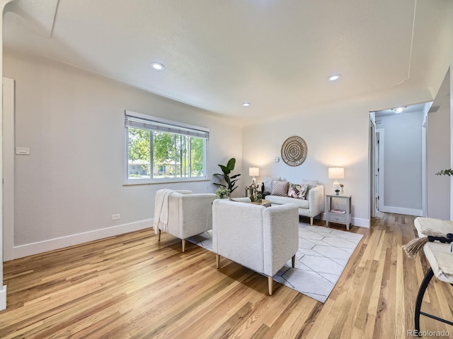 50 Yarrow St, Lakewood, CO 80226 - living area featuring light wood-style floors, baseboards, and recessed lighting