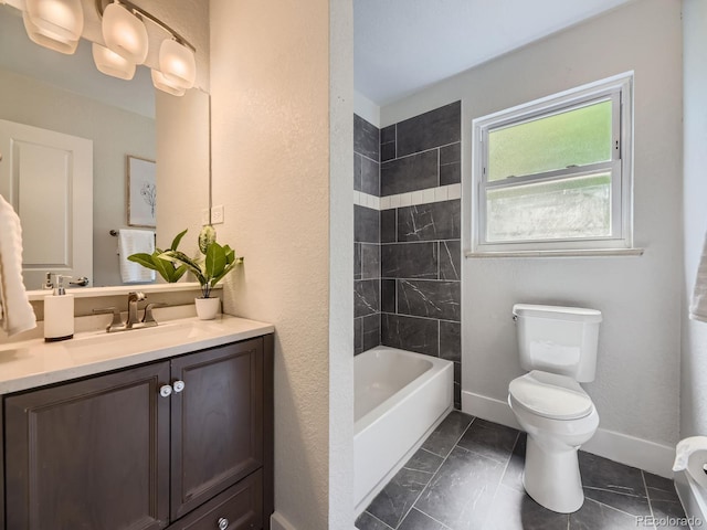50 Yarrow St, Lakewood, CO 80226 - bathroom with toilet, vanity, baseboards,  shower combination, and a textured wall