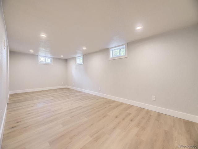 50 Yarrow St, Lakewood, CO 80226 - basement featuring recessed lighting, baseboards, light wood-style floors, and healthy amount of natural light