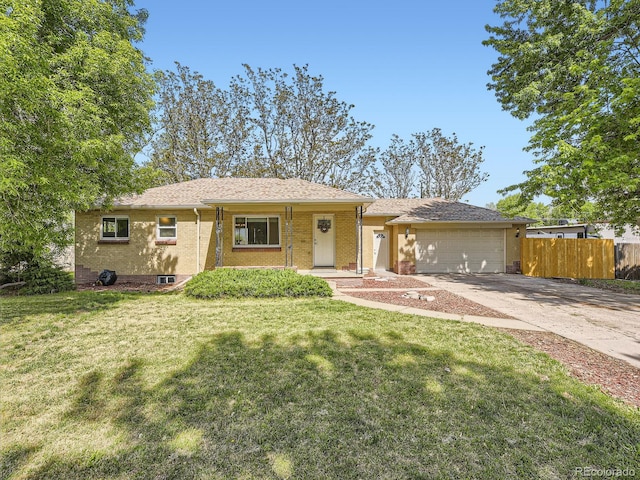 50 Yarrow St, Lakewood, CO 80226 - ranch-style home featuring concrete driveway, an attached garage, and brick siding