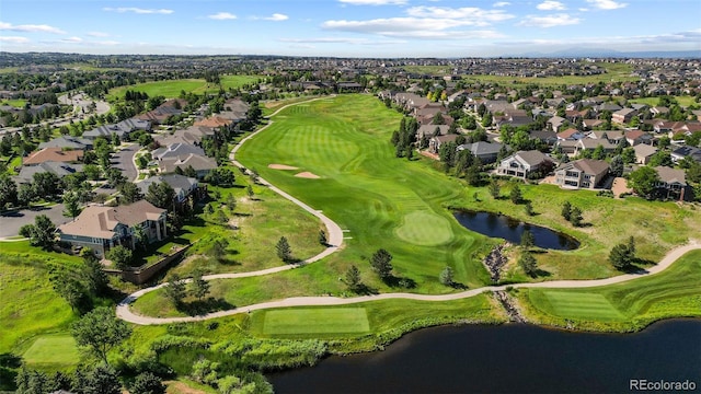 7713 S Zante Ct, Aurora, CO 80016 - aerial view of property and surrounding area with nearby suburban area, a nearby body of water, and a local golf course