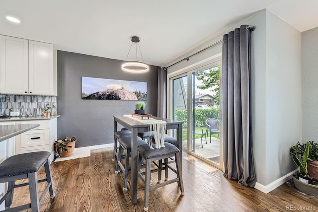 3378 Mowry Pl, Westminster, CO 80031 - dining area featuring dark wood-type flooring, baseboards, and recessed lighting