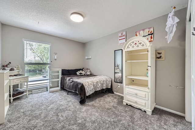 3378 Mowry Pl, Westminster, CO 80031 - carpeted bedroom with a textured ceiling and baseboards