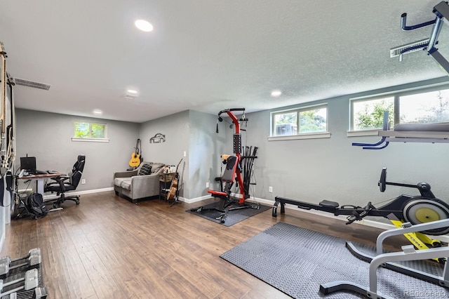 3378 Mowry Pl, Westminster, CO 80031 - workout room featuring wood finished floors, baseboards, and recessed lighting