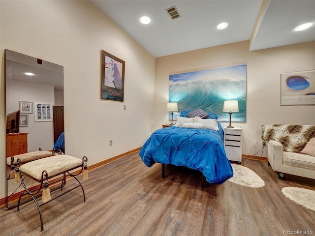 6533 S Quemoy Way, Aurora, CO 80016 - bedroom with recessed lighting, baseboards, visible vents, and wood finished floors