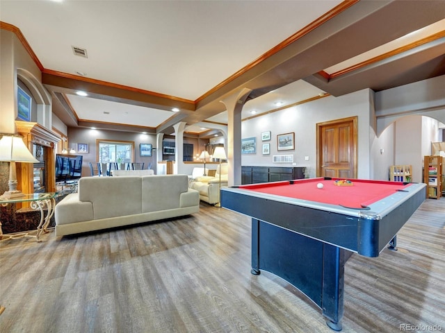6533 S Quemoy Way, Aurora, CO 80016 - playroom with wood finished floors, pool table, visible vents, crown molding, and arched walkways
