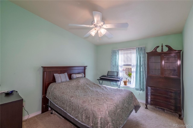 bedroom featuring carpet, baseboards, and a ceiling fan