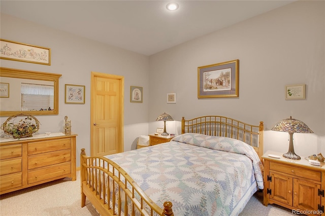 bedroom with light carpet
