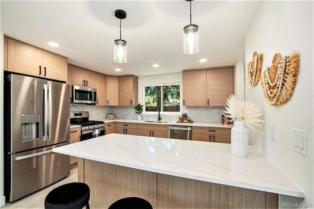 kitchen featuring light stone countertops, backsplash, decorative light fixtures, light brown cabinetry, and appliances with stainless steel finishes