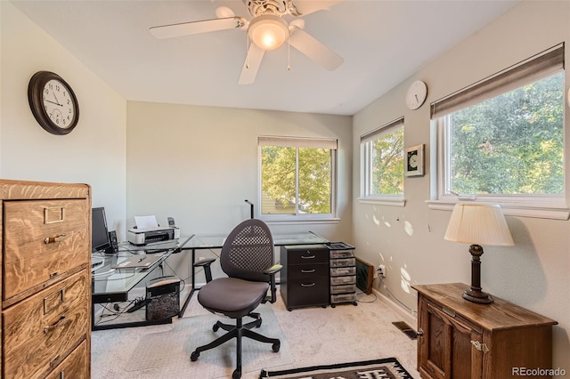 office with ceiling fan and light colored carpet