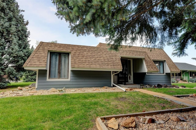 20 Scott Dr, Broomfield, CO 80020 - view of front property with a front yard and roof with shingles