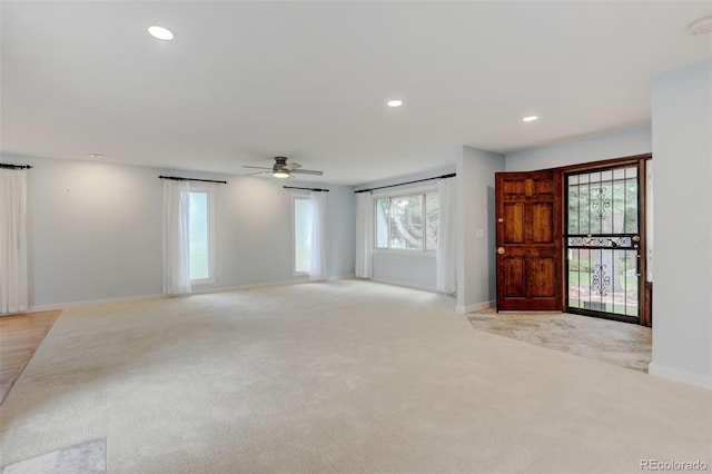 20 Scott Dr, Broomfield, CO 80020 - entryway with light colored carpet, healthy amount of natural light, baseboards, and recessed lighting