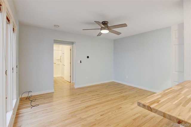 20 Scott Dr, Broomfield, CO 80020 - spare room with ceiling fan, light wood-type flooring, baseboards, and a smoke detector