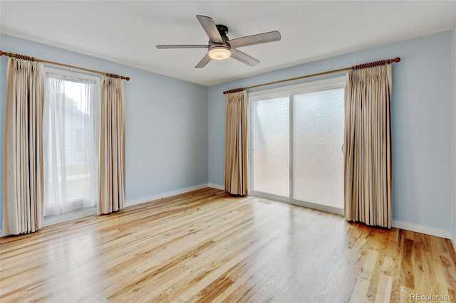 20 Scott Dr, Broomfield, CO 80020 - unfurnished room featuring plenty of natural light, wood finished floors, a ceiling fan, and baseboards