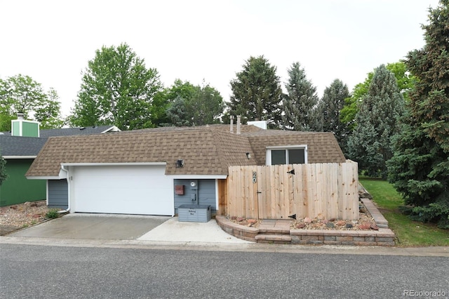 20 Scott Dr, Broomfield, CO 80020 - front facade featuring a shingled roof and mansard roof
