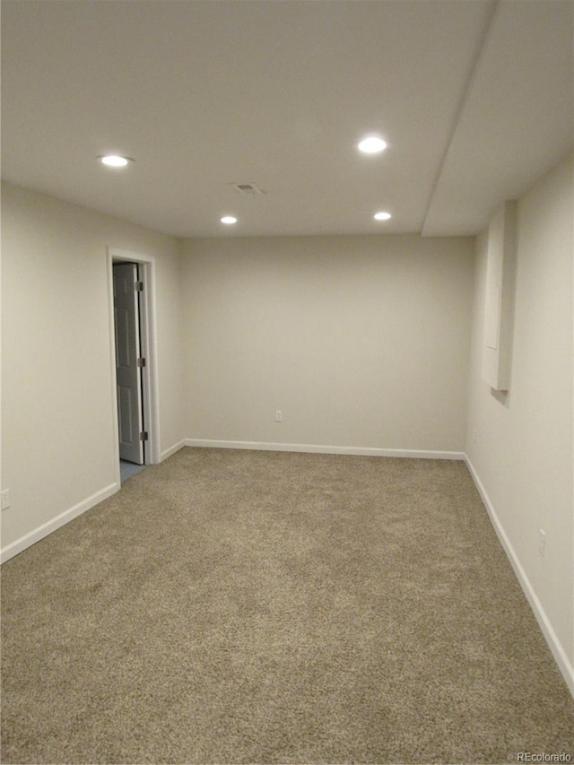 basement featuring carpet flooring