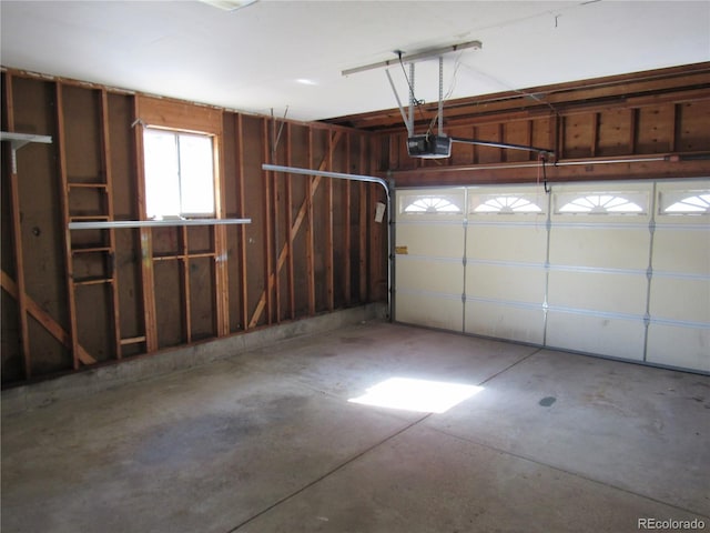 garage featuring a garage door opener