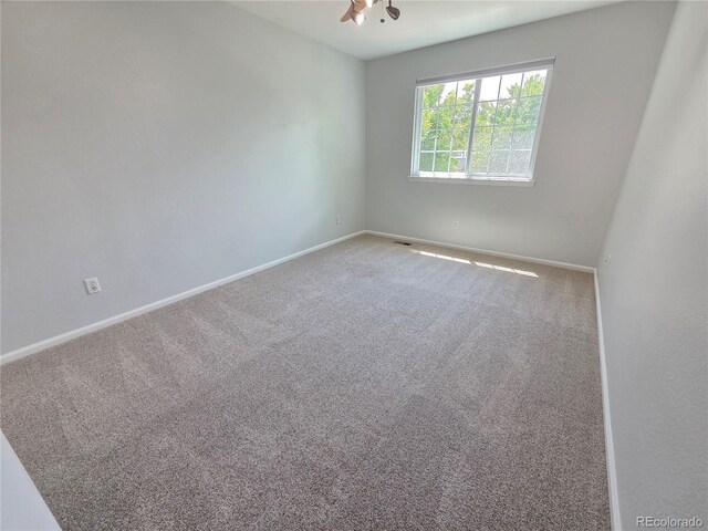 8772 S Carr Way, Littleton, CO 80128 - empty room featuring carpet