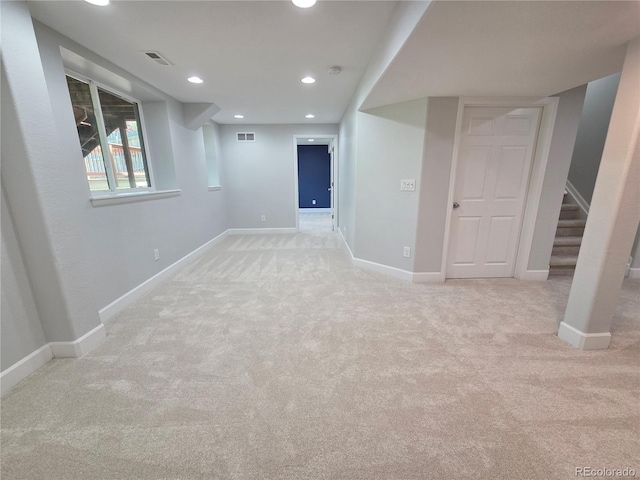 8772 S Carr Way, Littleton, CO 80128 - below grade area with carpet flooring, baseboards, recessed lighting, and stairs