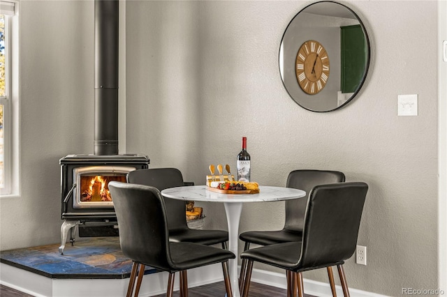 dining room with wood-type flooring