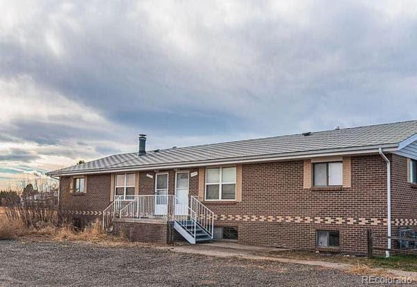 15800-15802 E 11th Ave, Aurora, CO 80011 - ranch-style house with brick siding