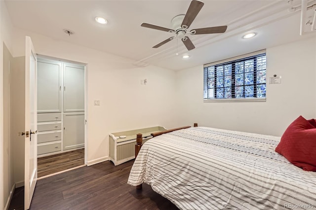 bedroom with dark wood-style flooring, baseboards, recessed lighting, and a ceiling fan