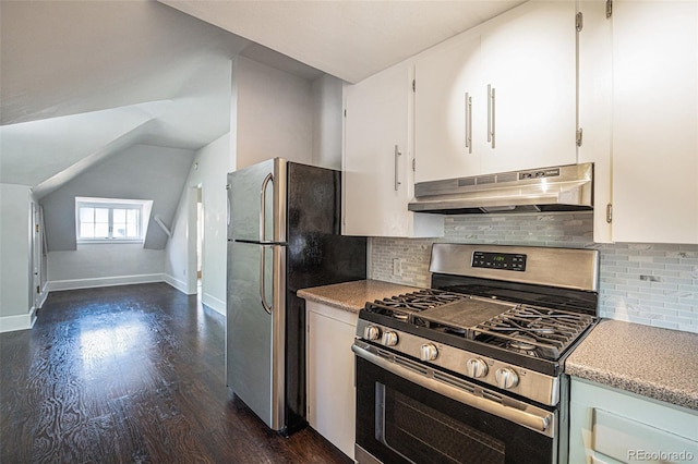 kitchen with stainless steel appliances, dark hardwood / wood-style floors, white cabinets, and decorative backsplash