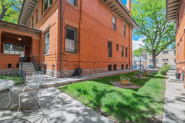 exterior space with a yard and a patio