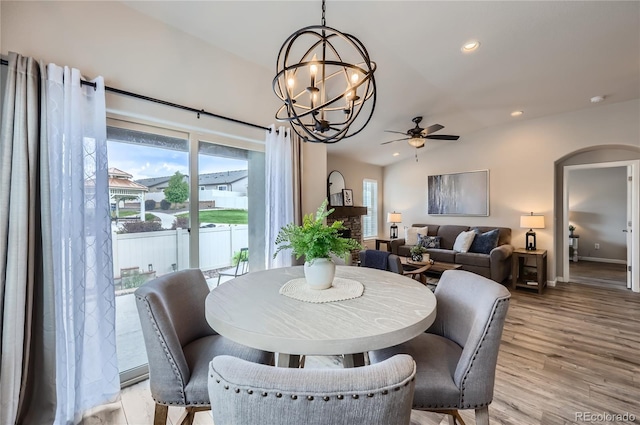 4318 Hessite Loop, Colorado Springs, CO 80938 - dining room with a chandelier, light wood-style flooring, ceiling fan, recessed lighting, and lofted ceiling