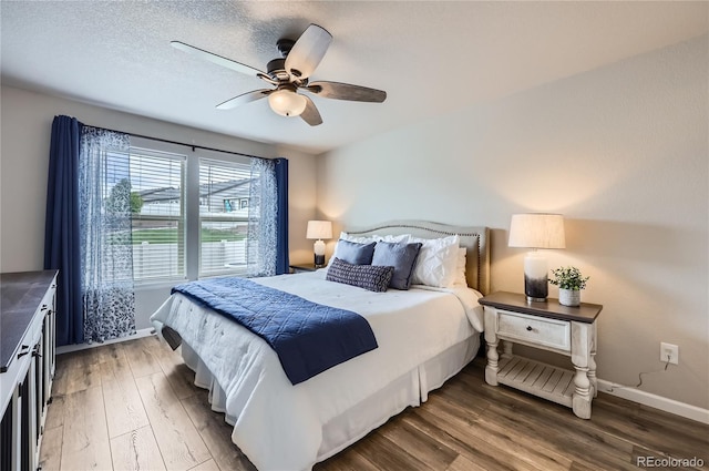 4318 Hessite Loop, Colorado Springs, CO 80938 - bedroom with wood finished floors and ceiling fan