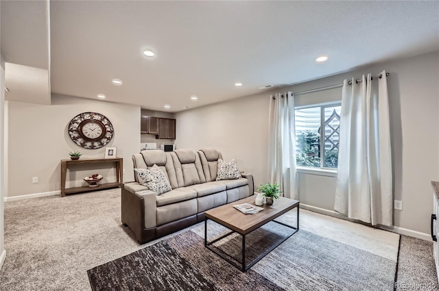4318 Hessite Loop, Colorado Springs, CO 80938 - living room featuring light colored carpet and recessed lighting