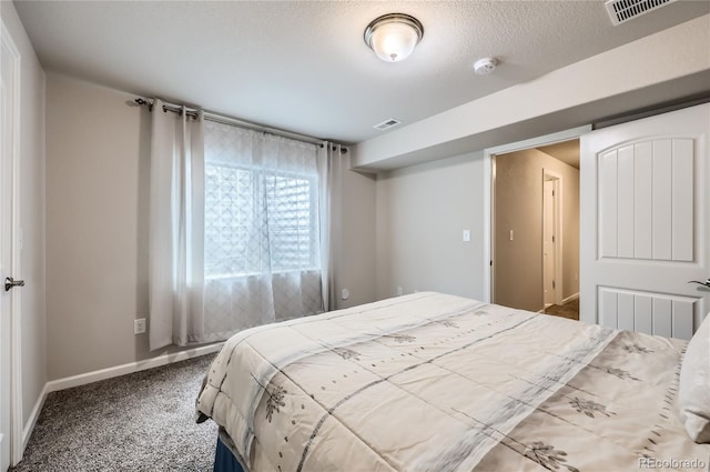 4318 Hessite Loop, Colorado Springs, CO 80938 - carpeted bedroom featuring baseboards and a textured ceiling