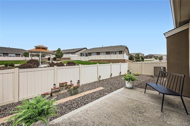 4318 Hessite Loop, Colorado Springs, CO 80938 - fenced backyard with a patio area, a residential view, and a gazebo