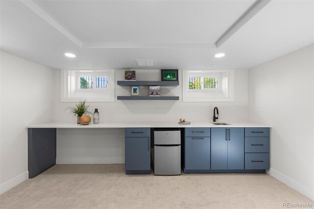 bar area with fridge, light colored carpet, a sink, recessed lighting, and baseboards
