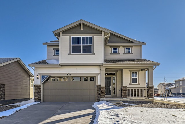 craftsman house with a garage and a porch