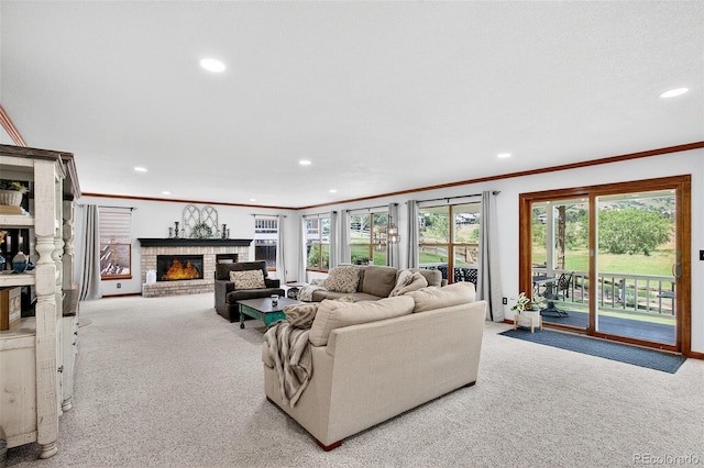1 Amaranth Dr, Littleton, CO 80127 - living area featuring carpet, recessed lighting, crown molding, plenty of natural light, and a brick fireplace