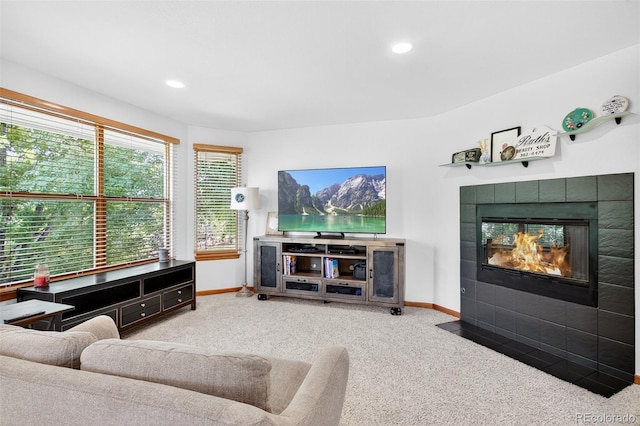 1 Amaranth Dr, Littleton, CO 80127 - carpeted living room with a tiled fireplace and recessed lighting