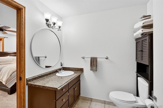 1 Amaranth Dr, Littleton, CO 80127 - bathroom featuring vanity, ensuite bath, ceiling fan, and tile patterned flooring
