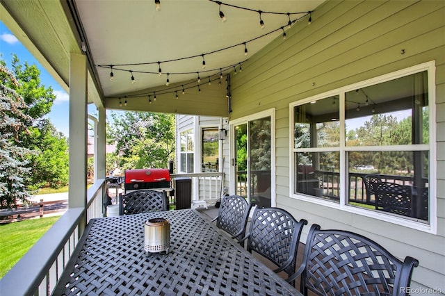 1 Amaranth Dr, Littleton, CO 80127 - view of patio featuring outdoor dining space and a grill
